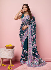 Teal colour saree looking fashionable